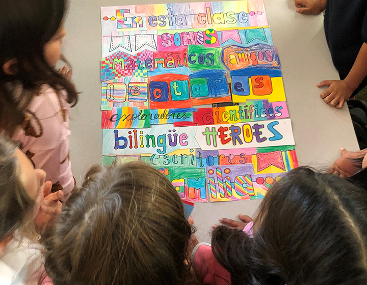 students creating a poster of affirmations