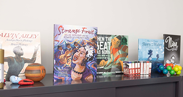 A sampling of books displayed in Stone's office at Shorewood High School.