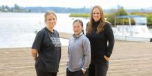 Three women standing together