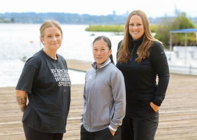 Three women standing together